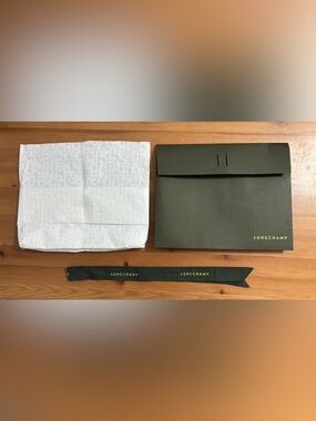Longchamp gift box with tissue paper and ribbon